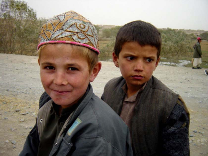 Two Boys One with Hat